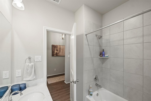 3306 Old Ironwood Dr, Spring, TX 77386 - full bath with bathtub / shower combination, wood finished floors, and vanity