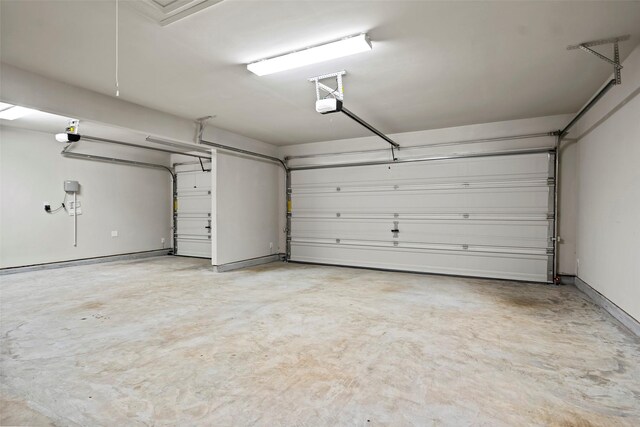 3306 Old Ironwood Dr, Spring, TX 77386 - garage featuring a garage door opener