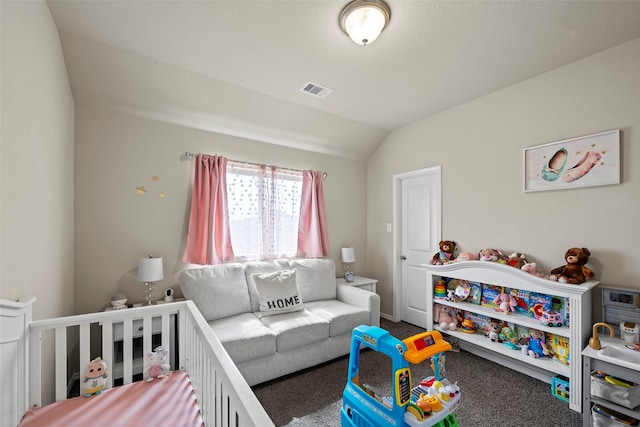 3306 Old Ironwood Dr, Spring, TX 77386 - carpeted bedroom featuring vaulted ceiling and a nursery area