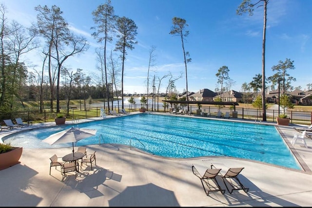 3306 Old Ironwood Dr, Spring, TX 77386 - community pool with fence and a patio area