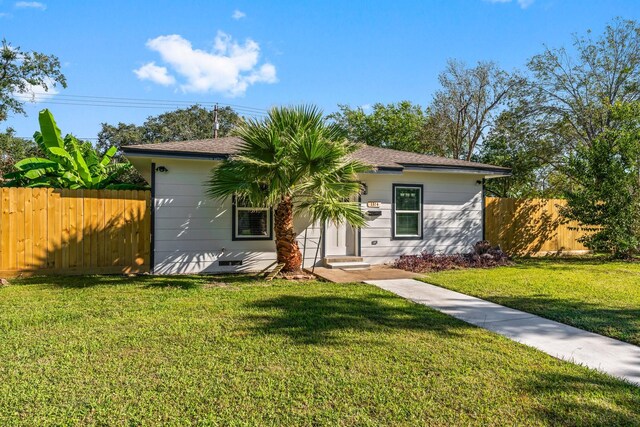 1314 W 4th St, Freeport, TX 77541 - ranch-style house with a shingled roof