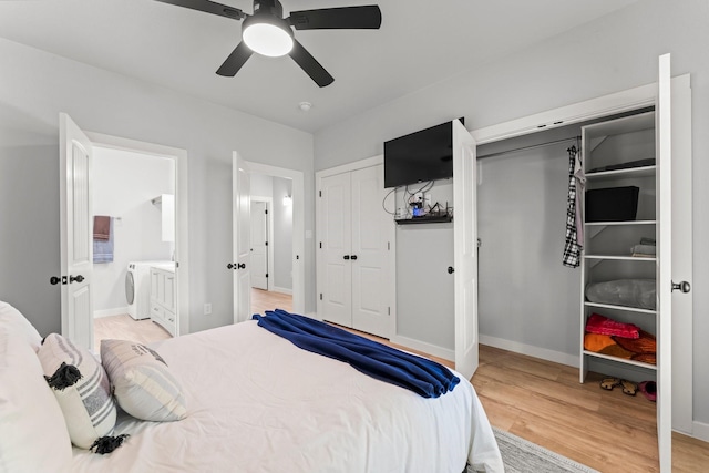 1314 W 4th St, Freeport, TX 77541 - bedroom with light wood finished floors, baseboards, ensuite bathroom, a ceiling fan, and multiple closets