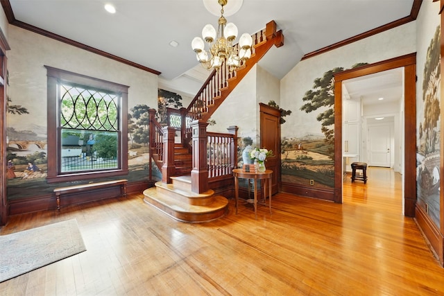 215 Bayland Ave, Houston, TX 77009 - bar area with light wood-type flooring, stairway, a chandelier, and crown molding