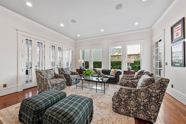 215 Bayland Ave, Houston, TX 77009 - living room featuring french doors, crown molding, wood finished floors, recessed lighting, and baseboards