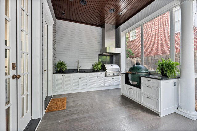 215 Bayland Ave, Houston, TX 77009 - mudroom with a sink, wood ceiling, and dark wood-style flooring