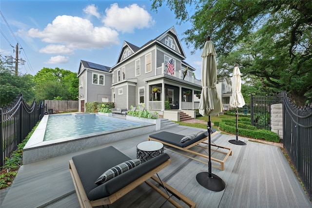 215 Bayland Ave, Houston, TX 77009 - back of property featuring a deck and a fenced backyard