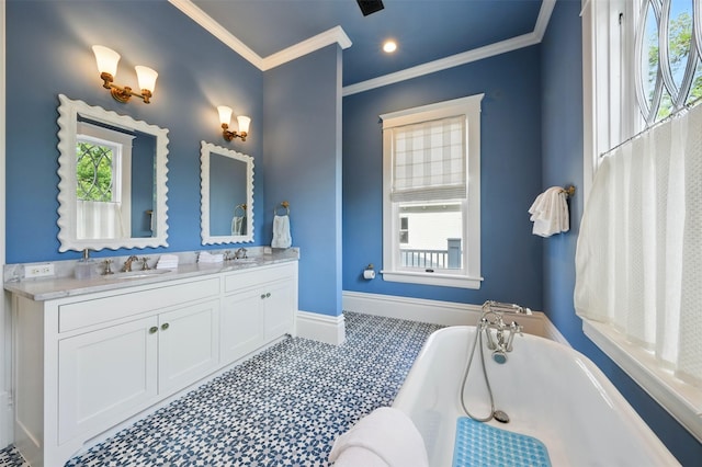 215 Bayland Ave, Houston, TX 77009 - full bath featuring a freestanding bath, crown molding, double vanity, and baseboards