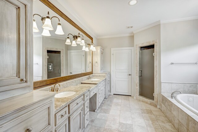 bathroom with ornamental molding, a garden tub, a shower stall, and double vanity
