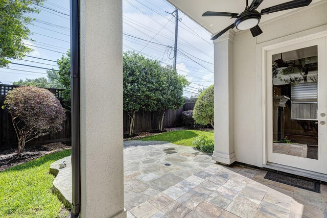 view of patio with ceiling fan and a fenced backyard