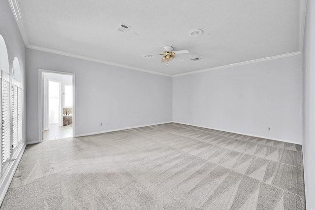 1803 Quiet Country Ct, Houston, TX 77345 - spare room with ornamental molding, carpet floors, ceiling fan, and baseboards