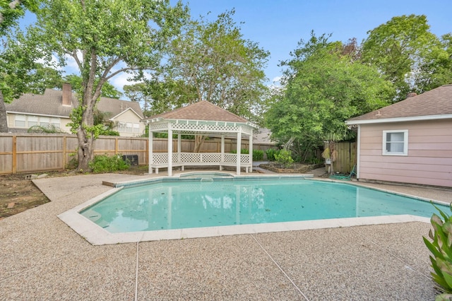 1803 Quiet Country Ct, Houston, TX 77345 - view of pool with a gazebo, a fenced backyard, a pool with connected hot tub, and a patio
