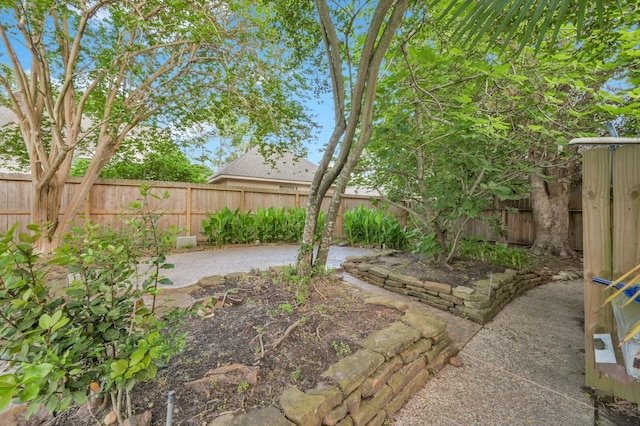 1803 Quiet Country Ct, Houston, TX 77345 - fenced backyard with a patio area
