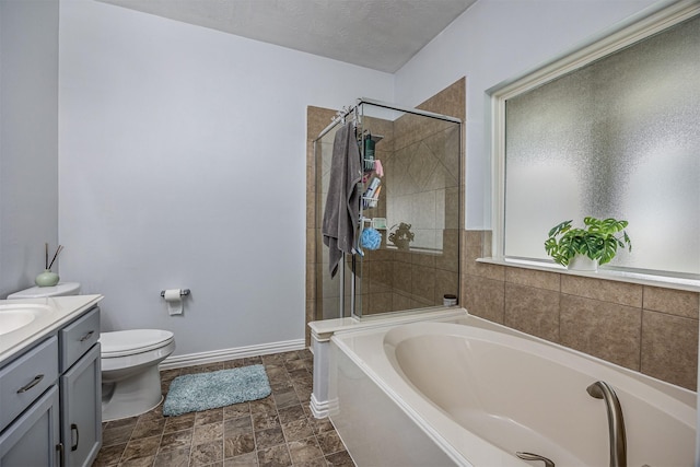 bathroom with toilet, a bath, vanity, baseboards, and a tile shower