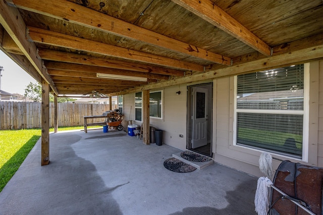 view of patio / terrace featuring fence