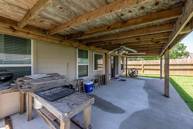 view of patio featuring fence