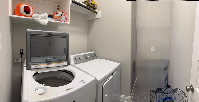 7010 Goldstrum Way, Katy, TX 77493 - laundry room featuring washing machine and dryer