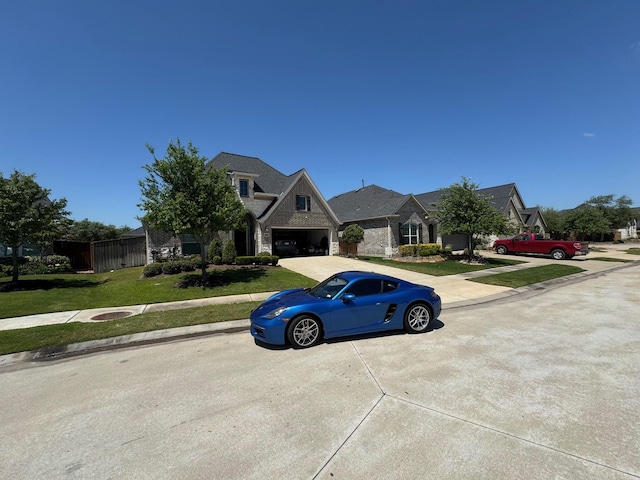 7010 Goldstrum Way, Katy, TX 77493 - view of front of property featuring driveway, a front lawn, and brick siding