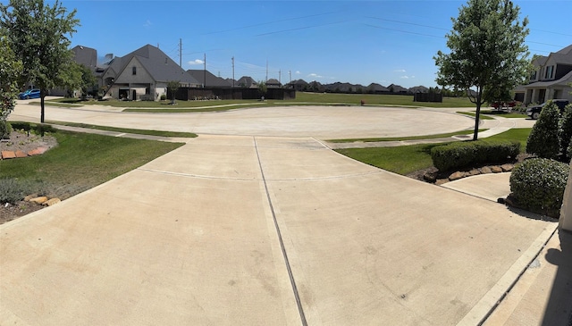 7010 Goldstrum Way, Katy, TX 77493 - view of concrete surface featuring a residential view