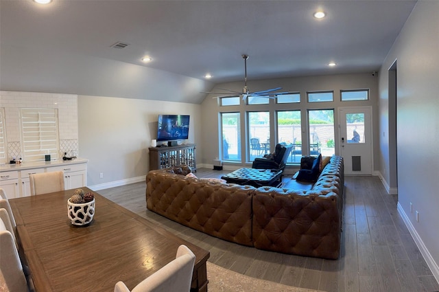 7010 Goldstrum Way, Katy, TX 77493 - living area featuring ceiling fan, baseboards, wood finished floors, lofted ceiling, and recessed lighting