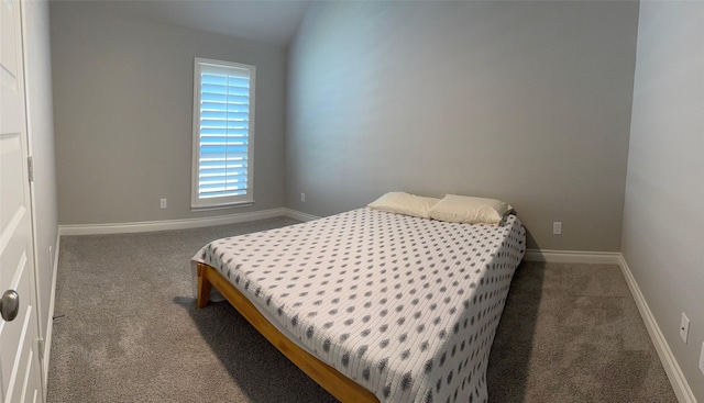 7010 Goldstrum Way, Katy, TX 77493 - bedroom with carpet, baseboards, and vaulted ceiling