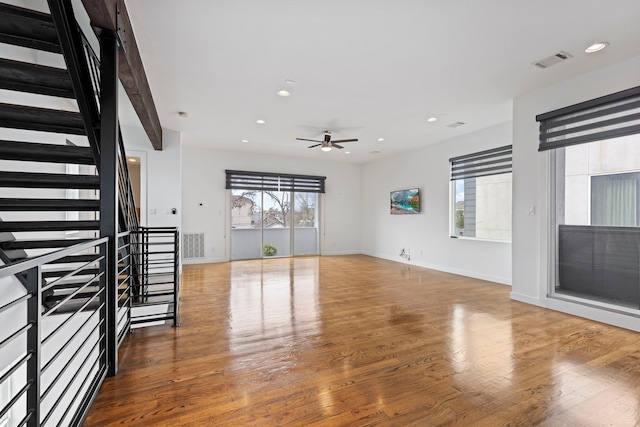 910 W 19th St Unit A, Houston, TX 77008 - unfurnished living room featuring ceiling fan, wood finished floors, stairway, baseboards, and recessed lighting