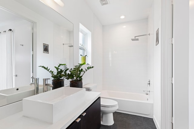 910 W 19th St Unit A, Houston, TX 77008 - bathroom featuring vanity,  shower combination, tile patterned flooring, and recessed lighting