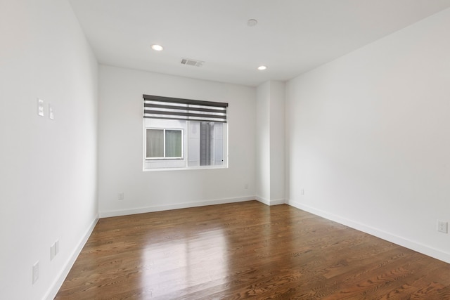910 W 19th St Unit A, Houston, TX 77008 - spare room featuring wood finished floors, recessed lighting, and baseboards