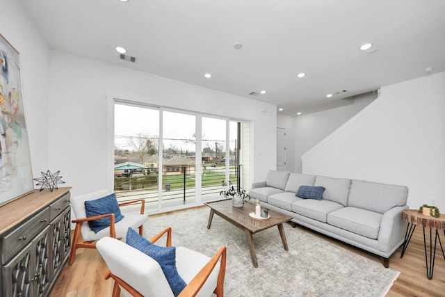 1218 English St, Houston, TX 77009 - living area with light wood finished floors and recessed lighting