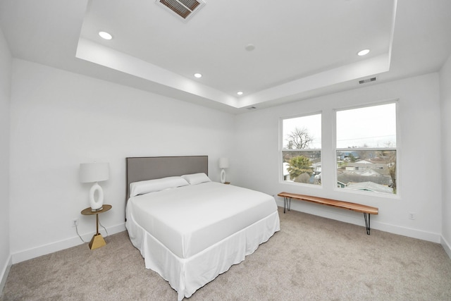 1218 English St, Houston, TX 77009 - bedroom featuring a tray ceiling, recessed lighting, carpet floors, and baseboards