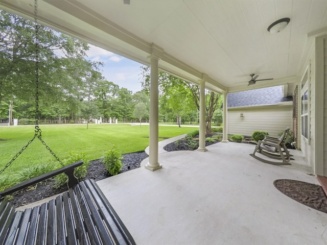 11987 White Oak Xing, Conroe, TX 77385 - view of patio featuring ceiling fan and view of wooded area