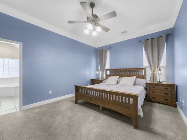 11987 White Oak Xing, Conroe, TX 77385 - bedroom with ornamental molding, carpet floors, baseboards, a ceiling fan, and connected bathroom
