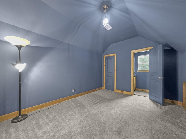 11987 White Oak Xing, Conroe, TX 77385 - bonus room with lofted ceiling, baseboards, and carpet