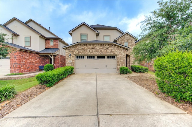 traditional-style home featuring stucco siding and concrete driveway