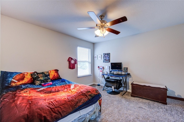 bedroom featuring carpet flooring, baseboards, and a ceiling fan