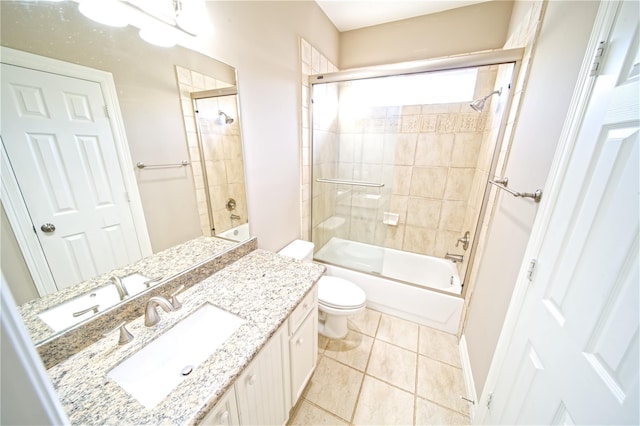 910 Peachwood Bend Dr, Houston, TX 77077 - full bathroom with toilet, vanity, shower / bath combination with glass door, and tile patterned flooring
