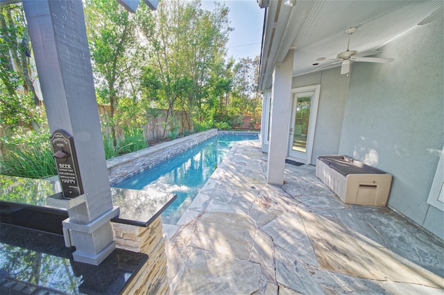 910 Peachwood Bend Dr, Houston, TX 77077 - view of swimming pool featuring ceiling fan, a fenced backyard, and a patio