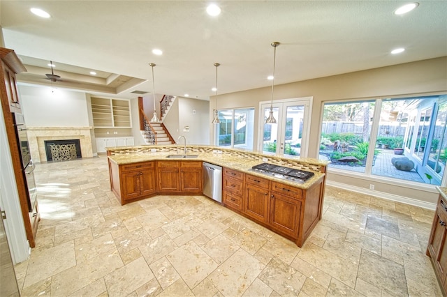 910 Peachwood Bend Dr, Houston, TX 77077 - kitchen featuring a sink, stainless steel appliances, open floor plan, recessed lighting, and stone tile floors