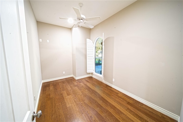 910 Peachwood Bend Dr, Houston, TX 77077 - empty room featuring wood finished floors, a ceiling fan, and baseboards