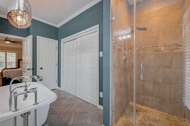 full bath featuring a stall shower, ensuite bathroom, baseboards, ornamental molding, and tile patterned floors