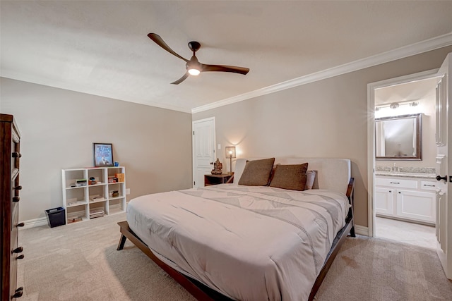 bedroom with light carpet, ornamental molding, ensuite bath, baseboards, and ceiling fan