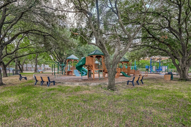 communal playground with a lawn