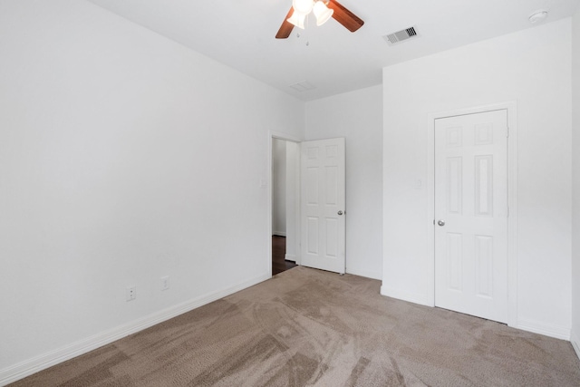 326 Lake Rim Dr, Rosenberg, TX 77469 - unfurnished bedroom with carpet, baseboards, and ceiling fan