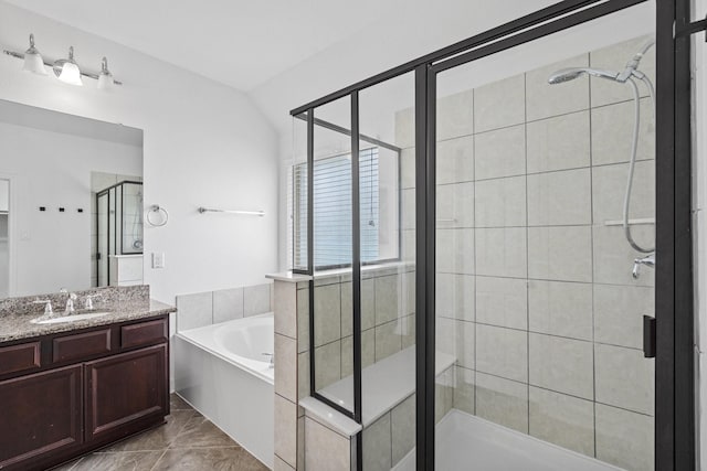 326 Lake Rim Dr, Rosenberg, TX 77469 - full bath with a shower stall, a bath, vanity, lofted ceiling, and marble finish flooring
