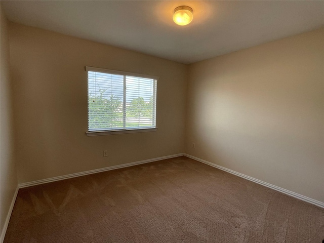 11317 Elegant Way, Houston, TX 77066 - carpeted empty room featuring baseboards