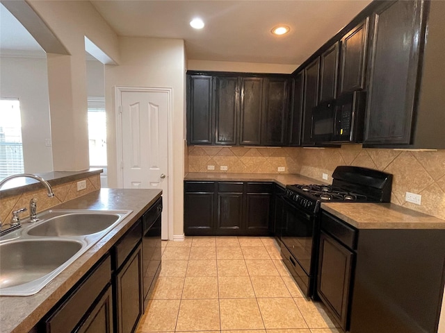 11317 Elegant Way, Houston, TX 77066 - kitchen featuring black appliances, a sink, tasteful backsplash, light tile patterned floors, and recessed lighting