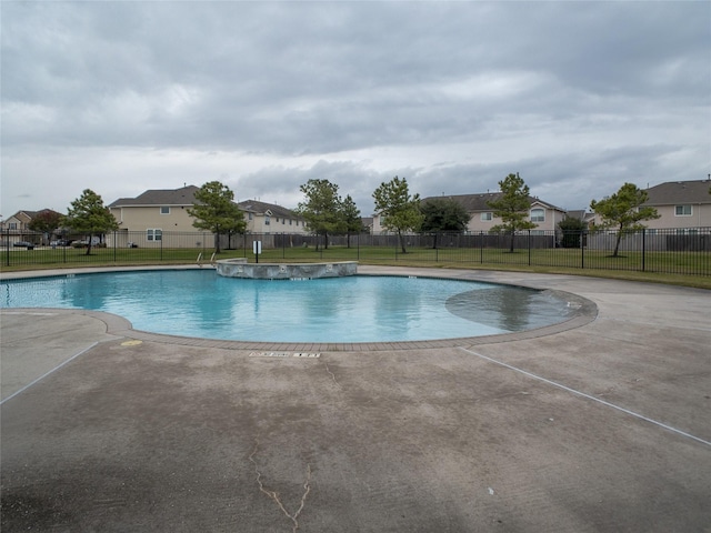 11317 Elegant Way, Houston, TX 77066 - community pool with a patio area and a residential view