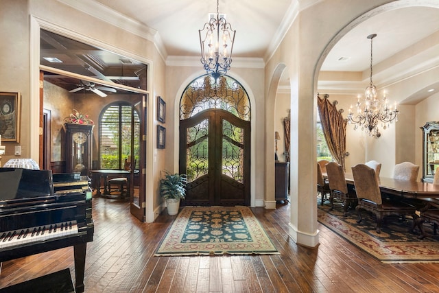38 Post Shadow Estate Dr, Spring, TX 77389 - foyer featuring a chandelier, arched walkways, french doors, dark wood-type flooring, and ornamental molding