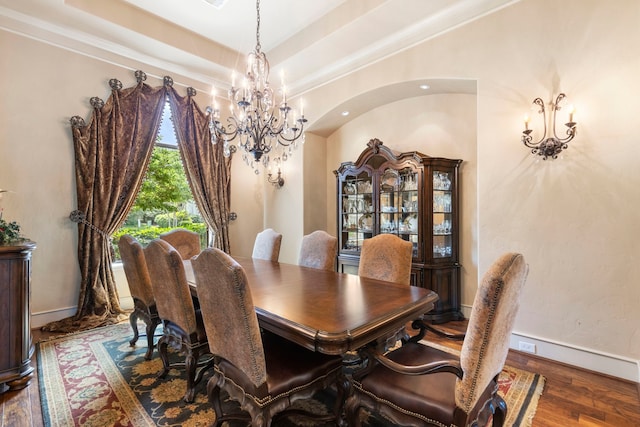 38 Post Shadow Estate Dr, Spring, TX 77389 - dining space with a chandelier, wood finished floors, and baseboards