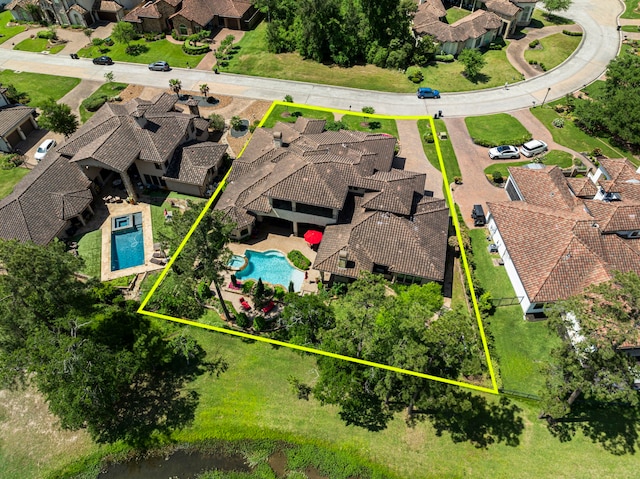 38 Post Shadow Estate Dr, Spring, TX 77389 - aerial perspective of suburban area featuring a pool area and property parcel outlined
