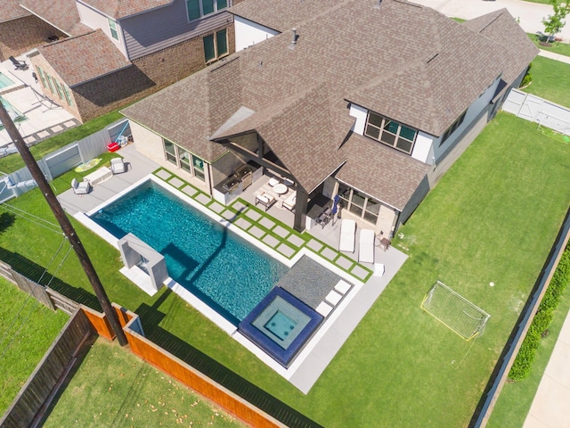view from above of property featuring a pool